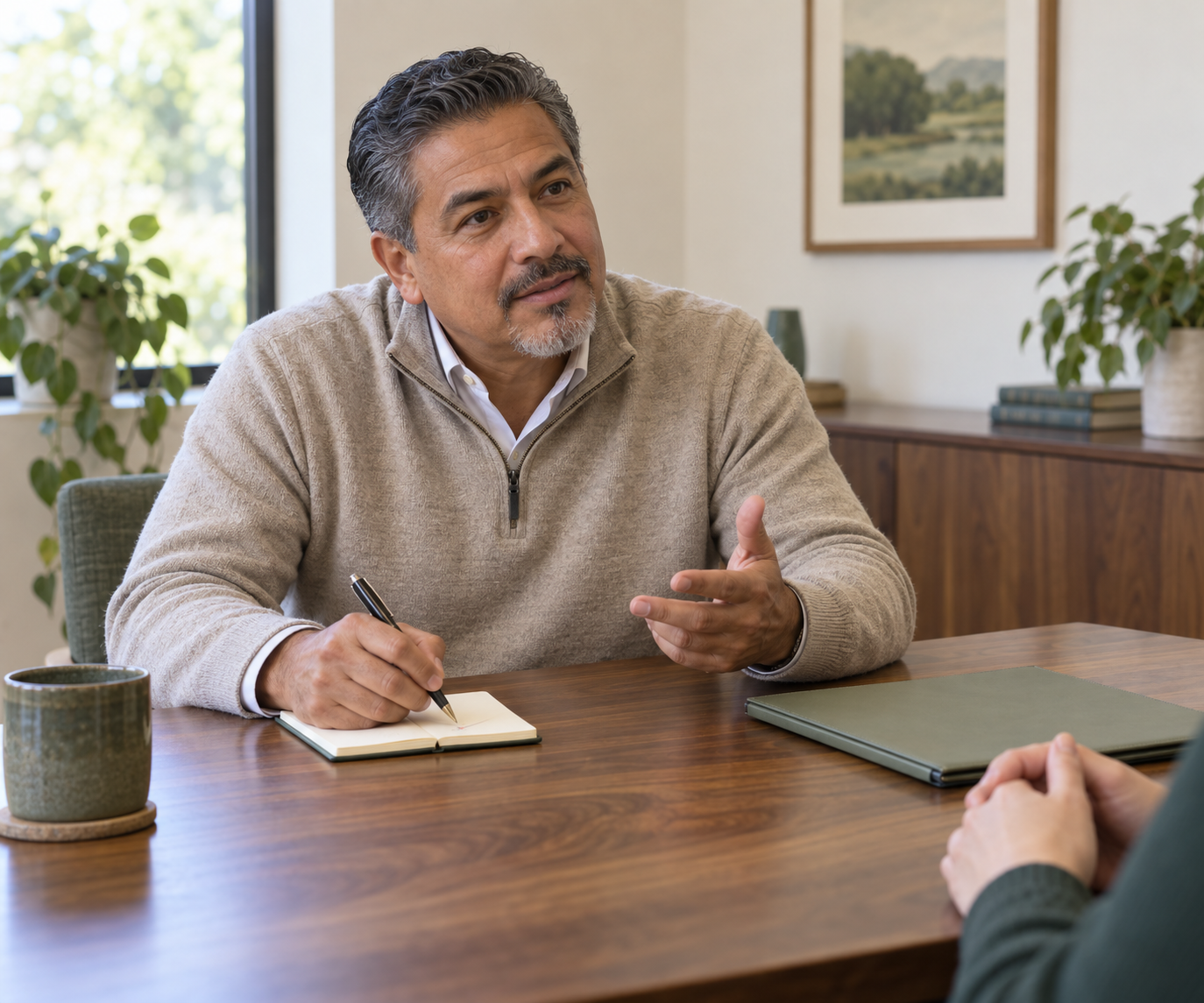 Man discussing psychological readiness results and next steps during a consultation.
